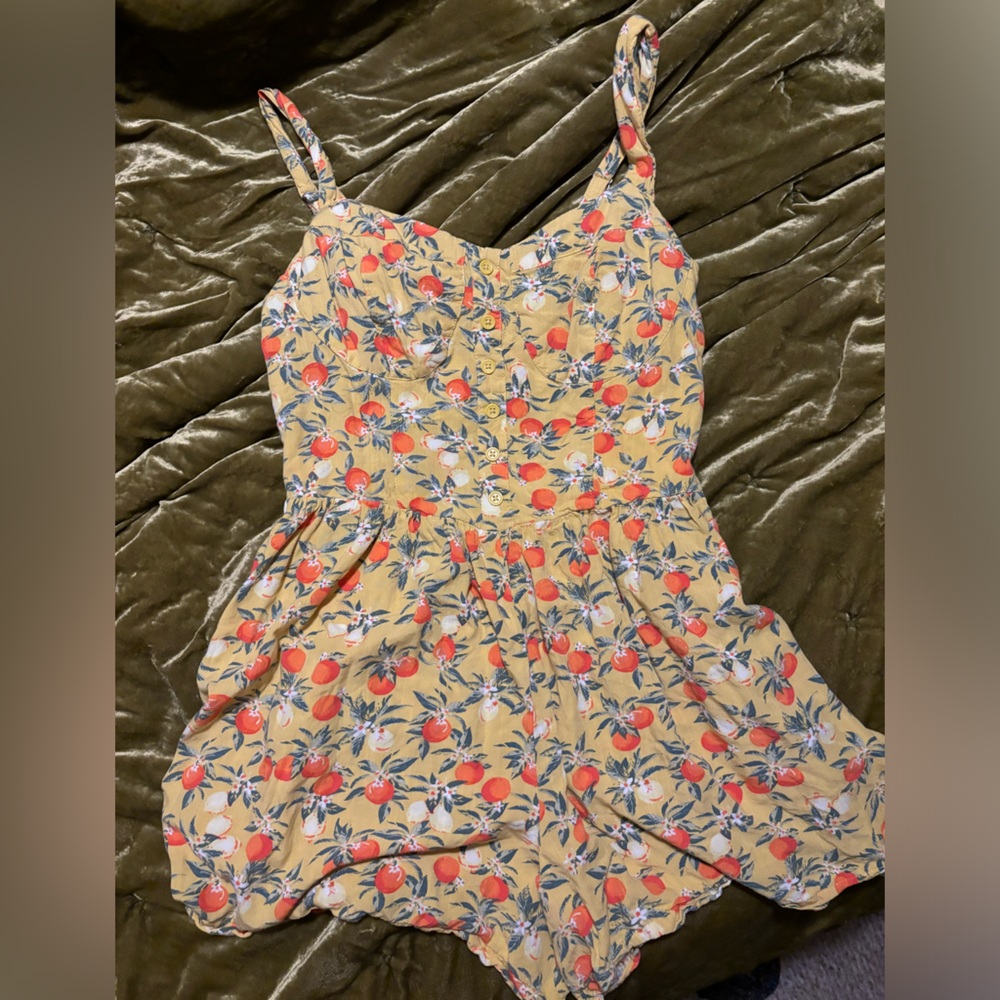 Yellow Romper With Orange Pattern - image 1